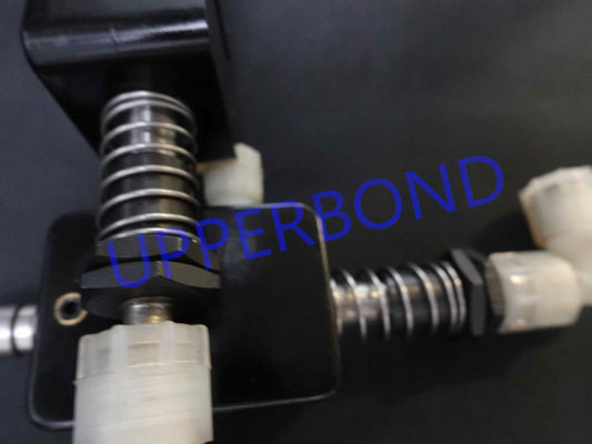 紙巻タバコ製造機械のための安定した出力のり付け部